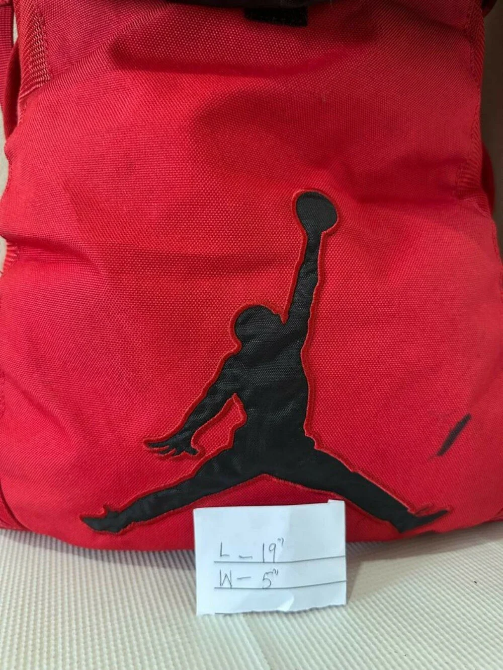 Jordan Jumpman Drawstring Backpack|Prominent Black Logo and a Top-loading Design